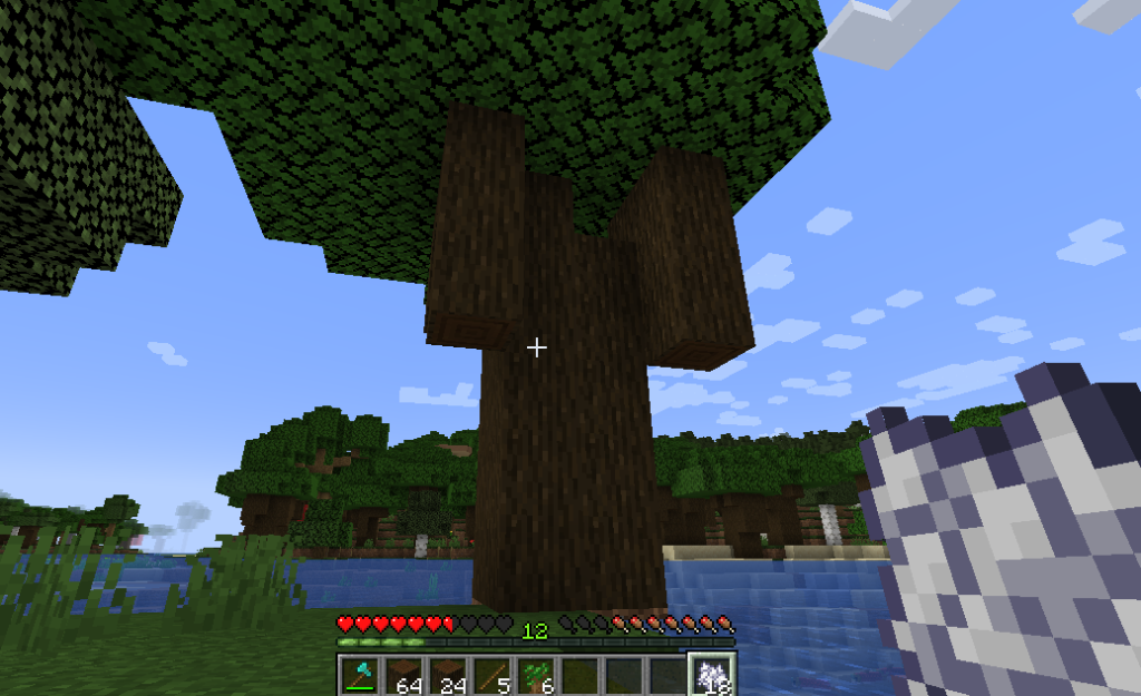 A dark oak tree that was quickly grown using bone meal. It's identical to other dark oak trees.
