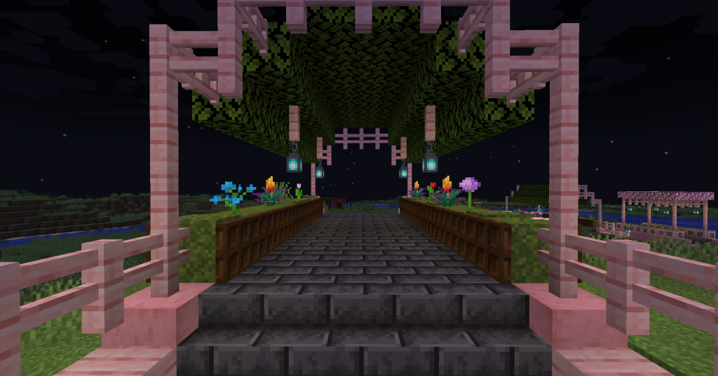Flowers, moss carpets, and other items can be added on top of the moss blocks to customize the bridge further.