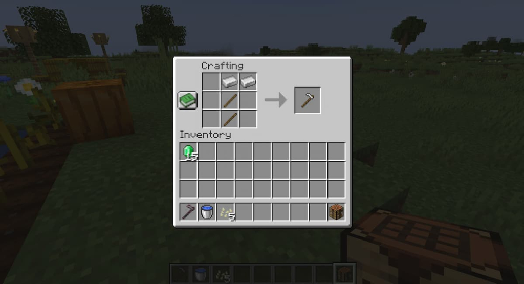 The crafting recipe for an iron hoe using two sticks, two iron ingots, and a crafting table.