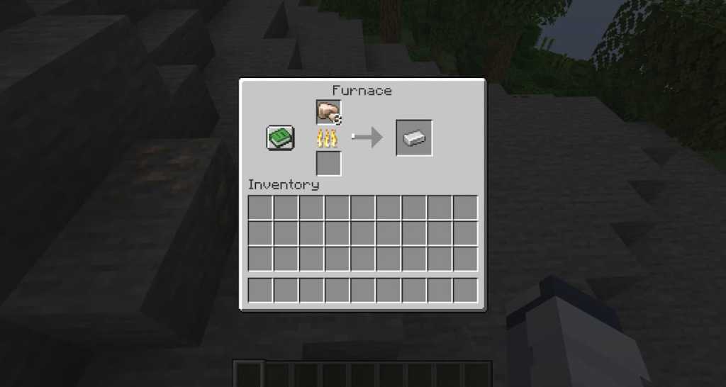 Smelting raw iron in a furnace produces iron ingots.