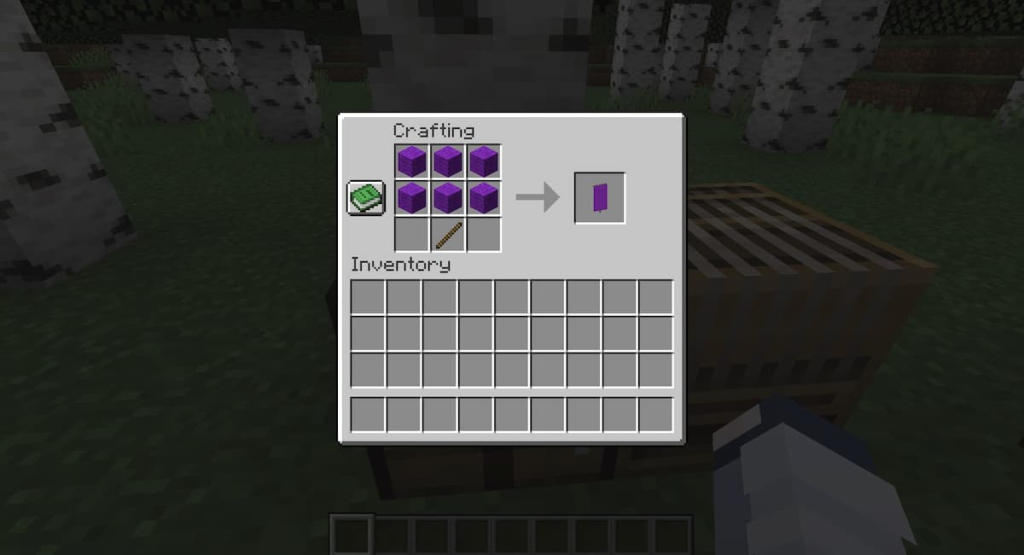 Crafting a purple banner in Minecraft.