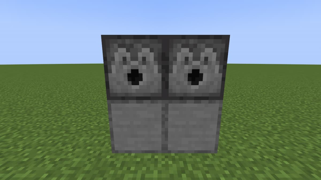 Building the base of a double door refrigerator using Dispensers and Smooth Stone in Minecraft.