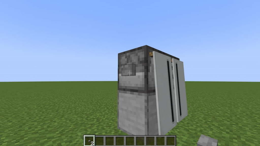 Adding the buttons to a double-door Minecraft refrigerator. 